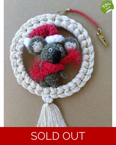 Handmade macrame wreath with handmade Koala standing in the wreath